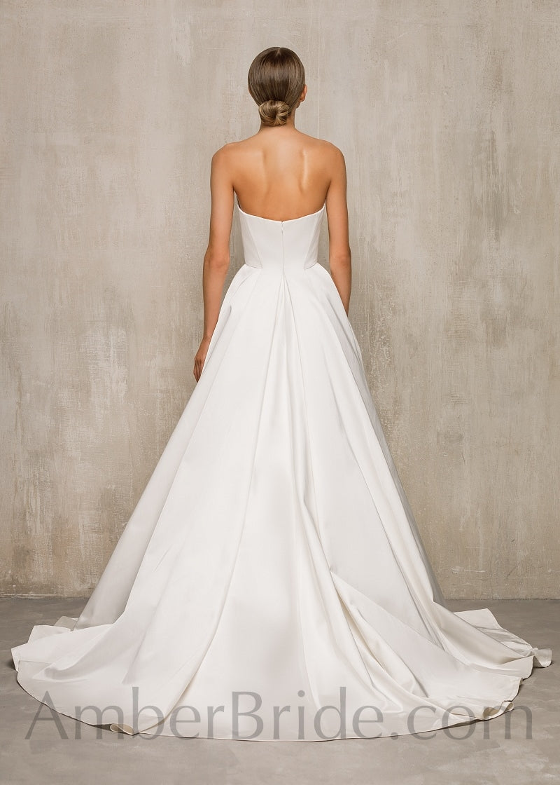 https://amberbride.com/cdn/shop/products/simple-ball-gown-backless-strapless-satin-wedding-dress-amberbride-2_2048x2048.jpg?v=1671543559